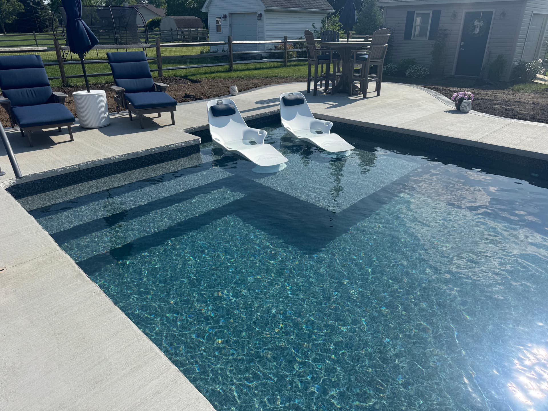 Gallery photos for Elevate Your Summer with a 16x32 Vinyl Liner Pool Featuring Tanning Ledge: Image #1